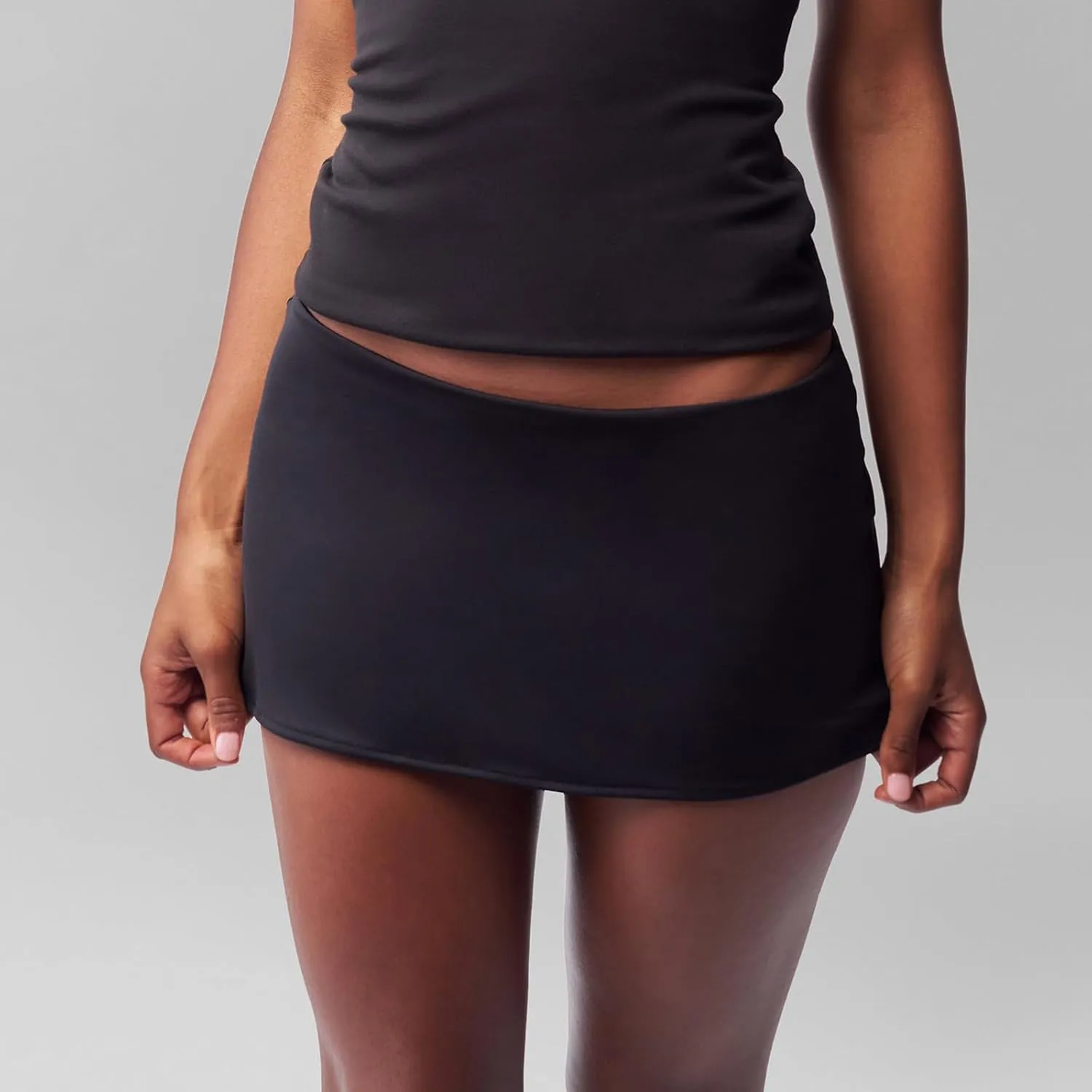 Faretumiya Solid Bodycon Mini Skirt for Women Low Waist Stretch Pencil Short Skirts Slim Fit Office Skirt Streetwear